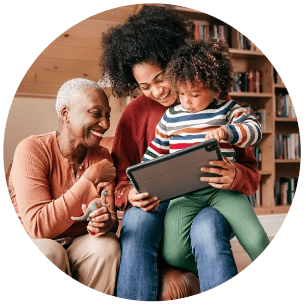 Child, mother, and grandma playing on tablet. Child, mother, and grandma playing on tablet.