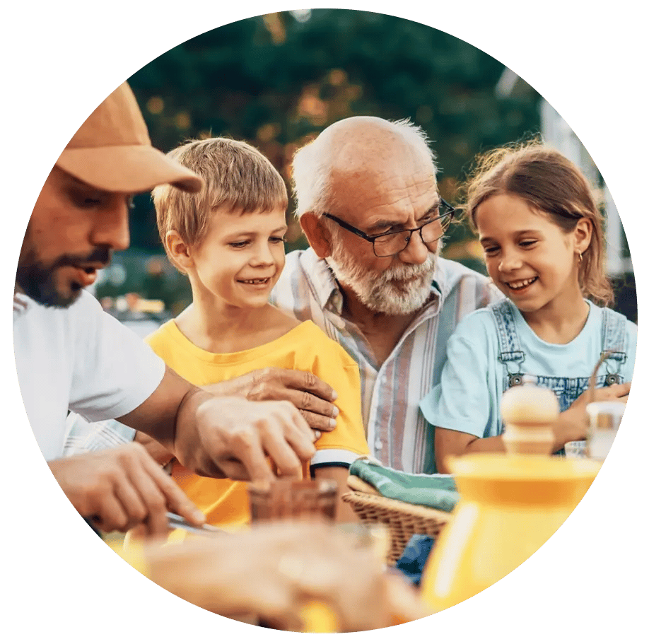 Family sitting at a picnic